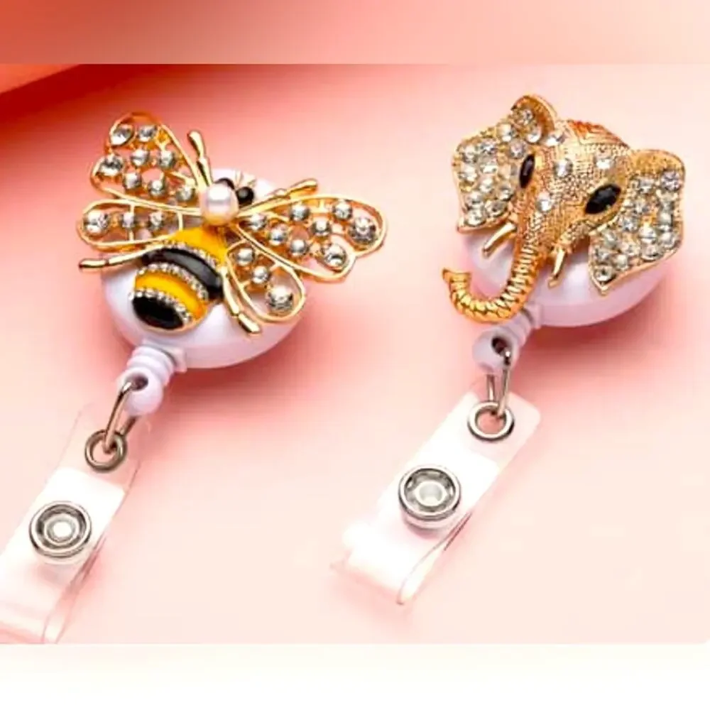 Set of 2 Name Badges. 1 Elephant and 1 Bee in Silvertone and Goldtone.